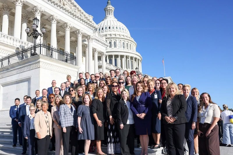 Group photo of care at home advocates outside the U.S. Capitol building.