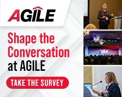 AGILE conference with speaker and audience engaging in discussion.
